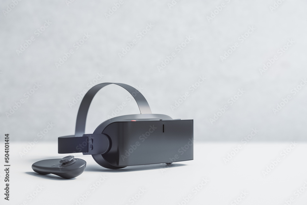 Aufkleber Virtual reality and metaverse concept with black VR headset and joystick on white table surface. 3D rendering