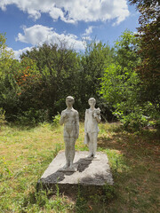 Abandoned sculpture of soviet girl and boy in Kahrkiv region, Ukraine.