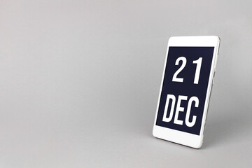 December 21st . Day 21 of month, Calendar date. Smartphone with calendar day, calendar display on your smartphone. Winter month, day of the year concept.
