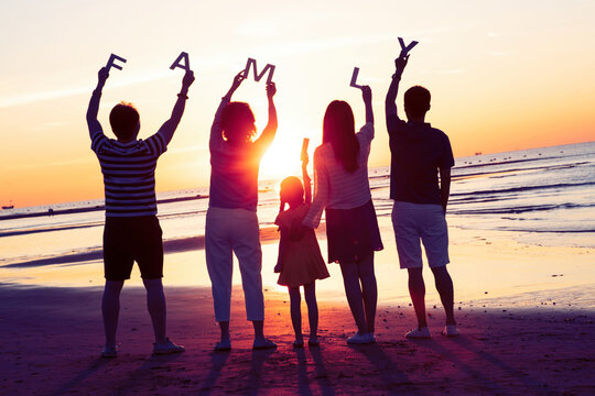 Happy families on holiday at the seaside