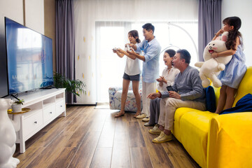 Happy families play games at home