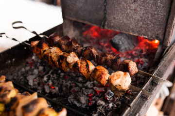 Barbecue, grilled meat, hot coals, the aroma of street food.