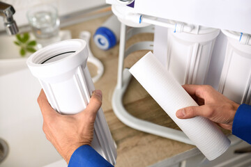 Changing filters for reverse osmosis maintenance detail