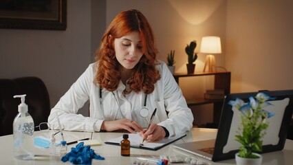 Young Italian doctor writes prescription on pen and paper for medicines