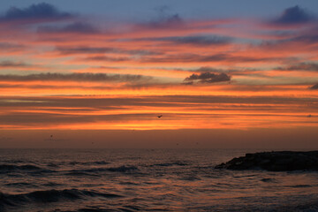 sunrise over the sea,water,sunset,sky, ocean, orange, cloud, beautiful,morning, red, waves, light, 