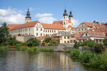 Fototapeta na wymiar View of Telč across a pond, Czech Republic