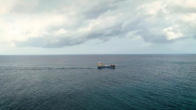 Aerial view of a ferry sailing the Indian Ocean
