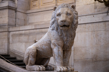 Sculpture of a lion inside the luxurious Royal Palace of Madrid.