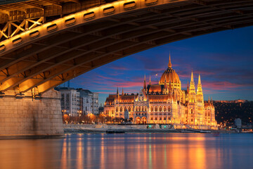 Fototapeta na wymiar Budapest, Hungary. Cityscape image of Budapest, capital city of Hungary with Margaret Bridge and Hungarian Parliament Building at sunset.