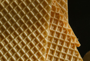 Stack of wafer or waffle sheets. Pattern wafle texture. Shallow depth of field. Top view