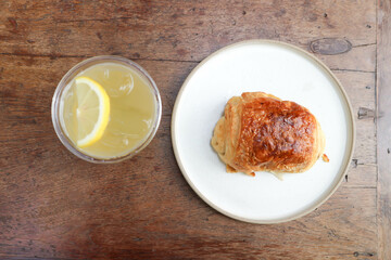 croissant , French croissant or French bread or bread and lenon juice
