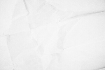 Crumpled white paper texture background for various purposes.