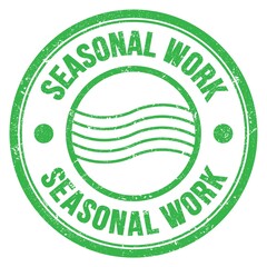 SEASONAL WORK text written on green round postal stamp sign