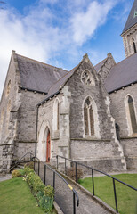 Fototapeta premium Dublin March 2022: Christ Church Rathgar (CCR) stands at a busy crossroads on the south side of Dublin, the capital city of Ireland.