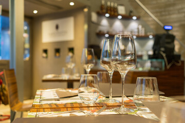 Glass goblets on the table in the restaurant selective focus, pleasant evening rest and relaxation