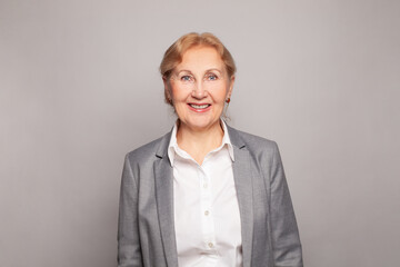 Portrait of happy senior business woman