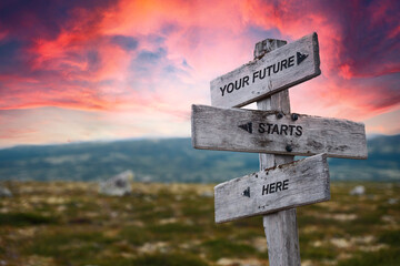 your future starts here text quote caption on wooden signpost outdoors in nature. Stock sign words theme. - obrazy, fototapety, plakaty
