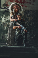 Naklejka premium Airsoft ssilhouetteier and indian woman in the silhouette industry building.