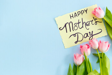 Happy Morhers Day concept - tulip flowers with greeting card