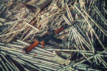 Kalashnikov assault rifles on the ground.