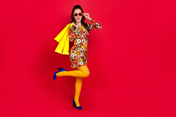 Photo of stunning lady buyer enjoy offer shopping bags wear tights skirt high heels isolated bright color background