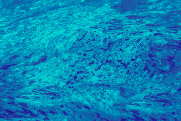 Fototapeta na wymiar blue water surface, under water abstract texture background