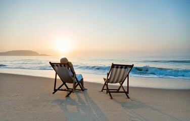 Young woman relaxing on the beach.