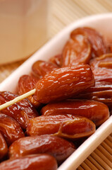 Fresh Tunisian dates fruits container.