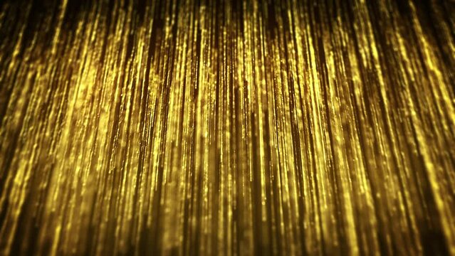 Abstract Gold Filaments Bursting Background/ 4k animation of an abstract wallpaper background of bursting gold filaments lines and particles sparkling with glimmer fx and depth of field seamless loopi