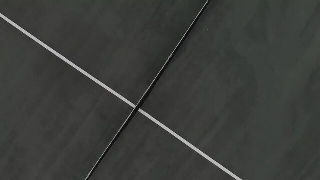 Video of rotating top view of tennis court