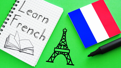 Fototapeta na wymiar Learn French is shown using the text and flag of France