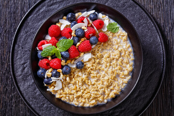 hulled whole grain oat porridge with berries