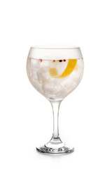 Gin tonic cocktail drink into a glass isolated on white background