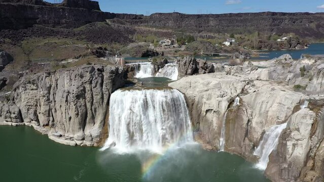 Beautiful Shoshone Falls with a rainbow in the foreground, drone shot.