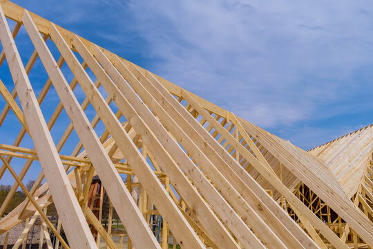 Framed home roof system with wooden timber beams roofing atic ceiling