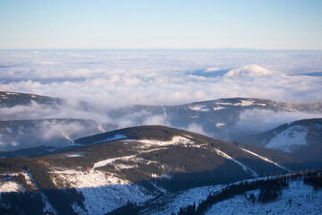 Fototapeta na wymiar Clouds over the hills of Karkonosze Krkonose