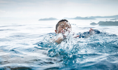 Boy swimming in the sea