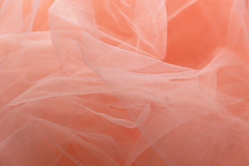 Pink tulle material background, pastel colors, romantic and delicate drapery
