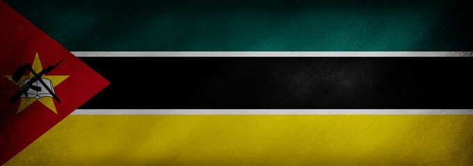 The flag of Mozambique on a retro background