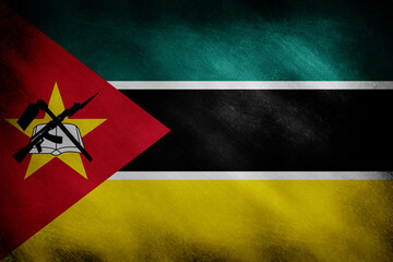 The flag of Mozambique on a retro background
