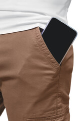 Close up of big mobile phone with empty black screen in front pocket of brown pants isolated on white background.