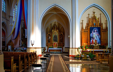 Fototapeta na wymiar View of the interior of the Catholic Church of the Nativity of the Blessed Virgin Mary, built in the years 1905-1912 in the neo-Gothic style in Rajgród in Podlasie, Poland.
