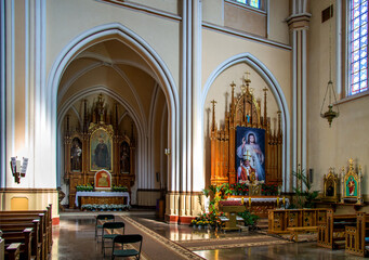 Fototapeta na wymiar View of the interior of the Catholic Church of the Nativity of the Blessed Virgin Mary, built in the years 1905-1912 in the neo-Gothic style in Rajgród in Podlasie, Poland.
