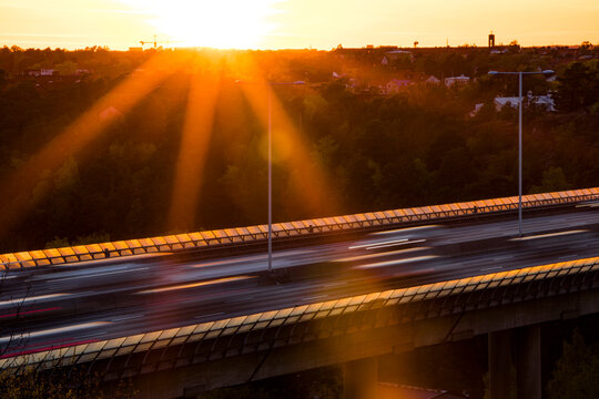 Stockholm, Sweden Traffic at sunset on the E4 highway known as Essingeleden.