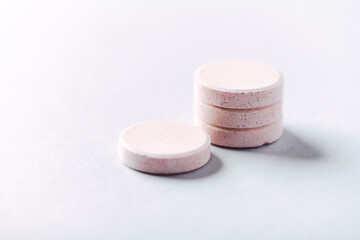 Collagen effervescent Tablets. Supplement to support collagen production. Bright paper background. Close up. Copy space.	