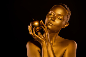 Portrait of beautiful woman close her eyes hold golden cover apple feel seduction want to try wicked forbidden treat - obrazy, fototapety, plakaty