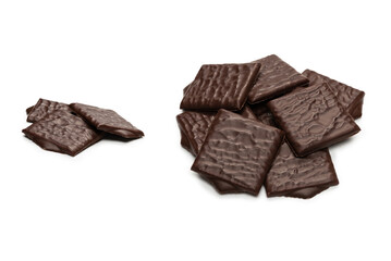 Dark chocolate candies isolated on white background.