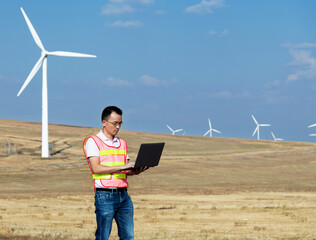 Windmill engineer  check wind turbine at construction site
