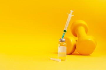 syringe is stuck in jar, there are dumbbells on yellow background next to it, a horizontal photo, copy space. concept of doping in sports, steroids, testosterone and other drugs prohibited in sports. - obrazy, fototapety, plakaty