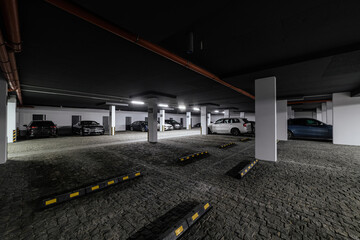 large underground parking for vehicles with separate spaces